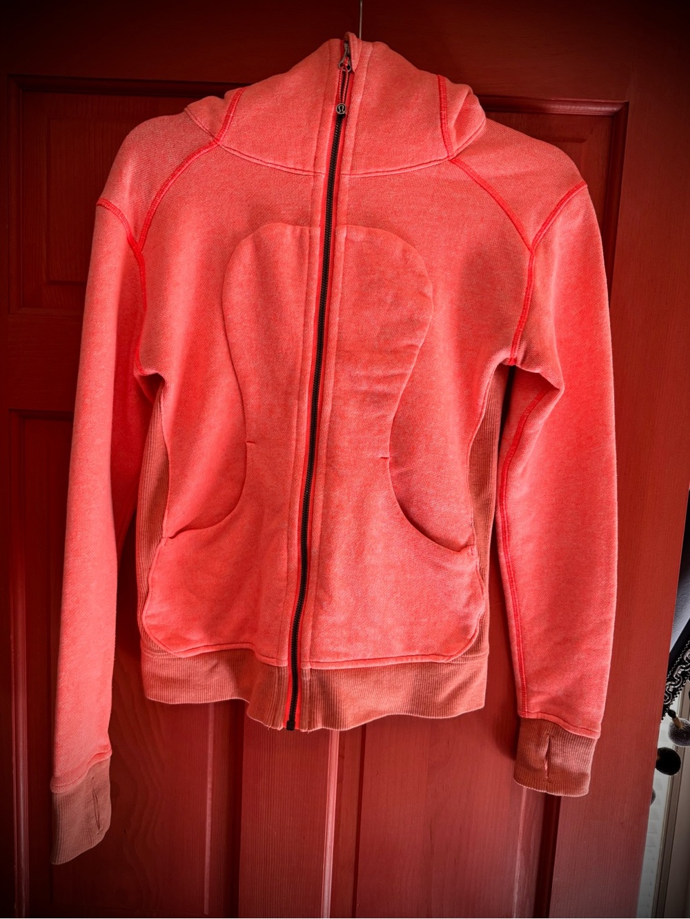 Lululemon zip front sweat jacket! Bright orange with white specks.